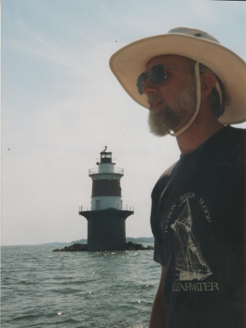 sailing past lighthouse